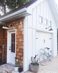 Board and batten cedar siding: The Studio I Ll Be Here All Week Getting Ready For Alleyways Mkt On Friday It S Going To Be A Party House With Porch Shingle Exterior Wood Shingle Siding