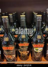 Baileys Liqueur In Glass Isolated On White Stock Photo Alamy