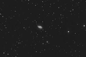 It is considered a grand design spiral galaxy and is classified as sb(s)b. Ngc 2608