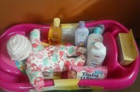 Shop for clothing, shoes, keepsakes, gift sets and more. Baby Shower Gift Diaper Stuffed Onsie Diaper Baby In Baby Bathtub Filled With Baby Products Baby Shower Baby Shower Gifts Baby Diapers