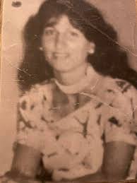 This is a photo of my mum could someone please clear it up thank you