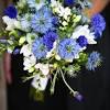 Colorful wildflower wedding bouquets with a burlap wrap. 1