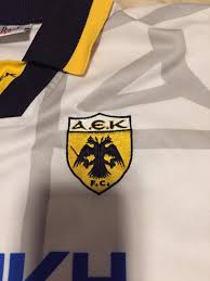 The current status of the logo is obsolete, which means the logo is not in use by the company anymore. Aek Athens Special Football Shirt 1994 1995