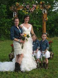 Southern Chic Wedding The Dress And Arch Are Beautiful The Bridesmaid Flower Girl S Dresses Southern Chic Weddings Country Chic Wedding Flower Girl Dresses