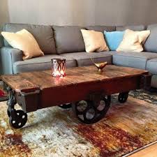 Lineberry Railroad Cart In Its New Home As A Coffee Table These Beauties Left With Unique Daisy Wheels Cart Coffee Table Coffee Table Coffee Table Restoration