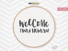 Shop fat quarter shop's high quality selection of cross stitch patterns, kits, & supplies. Welcome Tiny Human Counted Cross Stitch Pattern Baby Etsy In 2021 Cross Stitch Baby Baby Cross Stitch Patterns Cross Stitch Patterns