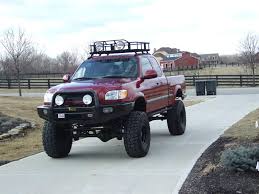 Looks Just Like Mine Except All The Mods I Can T Afford Lol Solid Front Axle Custom Bumpers What Toyota Tundra 4x4 Toyota Tundra Lifted 2000 Toyota Tundra