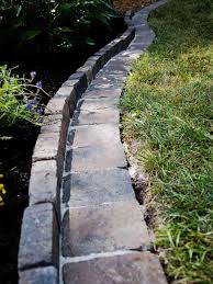 Garden edging helps to define and separate spaces in your garden, whilst also contributing to the overall garden design. Diy Paver Edging You Can Mow Hgtv