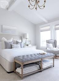 This space utilises a masterful combination of modern and traditional aesthetics.this bedroom has been cleverly portioned with a glazed panelling finish in a dark grey to create space for an en suite bathroom behind. 25 Soothing And Welcoming Grey Bedrooms Shelterness