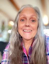 What do folks think about long silver hair? It used to be one had to cut  her hair at a certain age or wear it up. Now it seems length of any