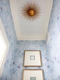 Contemporary light fixtures are elegantly crafted and have simple design elements that make them perfect for more modern designed rooms. Sunburst Light Fixture Transitional Bathroom Sara Tuttle Interiors