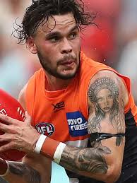 Born 8 december 1998) is a professional australian rules footballer playing for the richmond football club in the australian football league (afl). Afl Player Tattoos Club By Club Guide To Footballer Ink Herald Sun