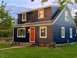Shutter colors for orange brick house. Very Navy By Behr House With White Trim Cedar Shutters Coming Soon House Paint Exterior House Exterior Exterior House Colors