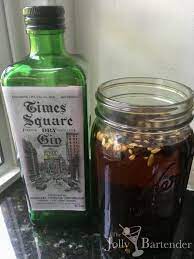 If you can find moonshine, well and good. The Jolly Bartender Homemade Bathtub Gin