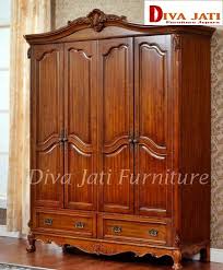 Lemari pakaian minimalis 2 pintu seri bogor dibuat dengan bahan material kayu jati solid dengan disain minimalis klasik dan di finishing warna salak brown, selain salak brown kami juga biasa membuat finishing warna golden teak, duco putih, duco biru, duco hijau, duko merah, merah mudah dan warna cer. Lemari Pakaian Surabaya Kayu Jati Minimalis 4 Pintu Modern