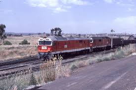 Nsw Sra 8176 And 8155 Haul A Southbound Freight Train Through Yass Junction Nsw 1985 Train Poconos Railway