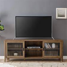 These tv cabinets rise a few feet above the ground floor and boast robust design ideas. Walker Edison 70 In Industrial Mesh Door Tv Console Reclaimed Barnwood W70arsmdro