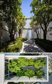20 000 Glass Blocks Were Used To Create A Condo Sales Gallery That Also Hides A Secret Garden Glass Blocks Building Design Courtyard