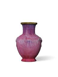 AN EXTREMELY RARE WUCAI 'DRAGON' BRUSHPOT, WANLI SIX-CHARACTER MARK IN  UNDERGLAZE BLUE WITHIN A DOUBLE CIRCLE AND OF THE PERIOD (1573-1619)