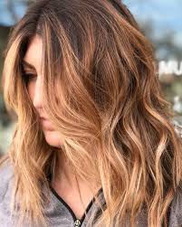 36 Best Light Brown Hair Color Ideas According To Colorists Light Brown Hair Hair Color Light Brown Honey Hair Color