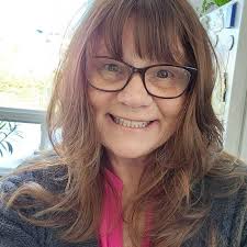 A rolling dumpster. Looks like it's made of recycled aluminum foil.