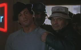 Reluctantly retired from fighting, rocky takes charge of mickey's gym and agrees to train a young protégé who's hungry for success.reluctantly retired from. Rocky V 1990 Starring Sylvester Stallone Talia Shire Burt Young Sage Stallone Burgess Meredith Tommy Morrison Richard Gant Tony Burton Directed By John G Avildsen Movie Review
