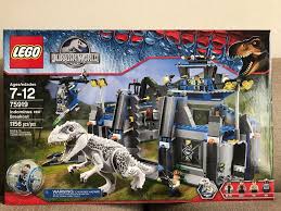 They put together the lego indominus rex breakout #75919. Dinosaur Lego Set Jurassic World Park 75919 White Indominus Rex Breakout Sealed Jurassic World Indominus Rex Lego Jurassic World Jurassic World