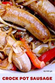 Tasty Easy Slow Cooker Sausage Sandwiches These Slow Cooked Sausages With Peppers And Onion How To Cook Sausage Stuffed Peppers Sausage And Peppers Crockpot