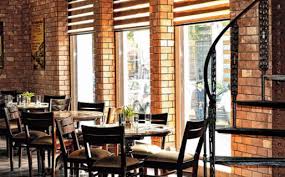 For traditional dining rooms you will want to opt for a full set of high backed formal dining chairs, whether these are upholstered, leather or wood framed. Walls Matching With The Old Great Eastern Bakery And The 180 Year Old Spiral Staircase Are Legen Picture Of The Bakery At The Lalit Great Eastern Kolkata Calcutta Tripadvisor