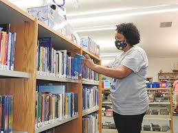 The assistant library director is responsible for the library in the absence of the. 2