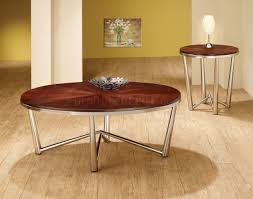 This glass coffee table has a glass table top that adds luster and dimension. 701798 3pc Coffee Table Set By Coaster W Brushed Nickel Base