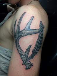 Feather and deer track tattoo on foot. Antler Turkey Feather Anchor Tattoo Piercing Facebook