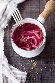 Fish tacos made with flaky and juicy cod, avocado crema, tomatoes, cabbage mix and the most incredible pickled onions all wrapped in a soft flour tortilla. Pickled Red Onions Quick Easy Feasting At Home
