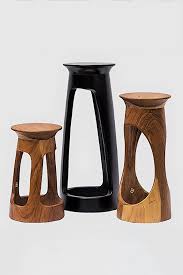 Recently Featured In Business Of Home This Sleek And Modern Wooden Side Table Finds Its Inspiration From The Djembe West Afri Carved Table African Decor Table