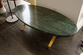 Dramatic curves sculpt a marble coffee table with novel, monumental presence. Oval Marble Coffee Table At 1stdibs