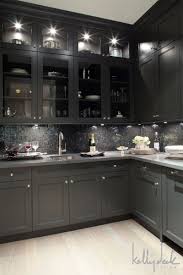 White kitchen cabinets with dark granite countertop. Pin By Brenndah Colyer On Kdd Keith Road Kitchen Design Grey Kitchen Cabinets Black Kitchens