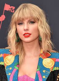 Taylor Swift's Signature Bangs Signify Their Own Eras