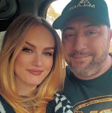 What does a car warning light with a fishbowl and plunger mean?