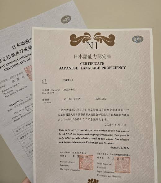 Really happy to have received my JLPT N1 certificate in the mail this month  and share that I've passed my JLPT N1 exam, representing the highest level  of Japanese proficiency! ✌️ My