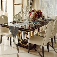The leather padding on the chairs juxtaposes beautifully with the rustic acacia wood that makes up the rest of the set. Luxury Design Modern Dining Room Furnitures Table And Chair Dining Room Sets Aliexpress