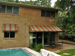 Create the warm, relaxed mood of french sidewalk cafes with bourbon street new orleans style wrought iron and copper awning. Fabric Awnings Traditional Pool New Orleans By La Custom Awnings And Shutters Houzz
