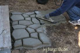 Finally, the diy concrete stepping stones are finished! Create Your Own Faux Stone Walkway For Less Than 40