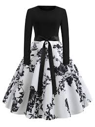 When you order $25.00 of eligible items sold or fulfilled by amazon. 50s Ribbon Tie Floral Print Flared Dress Shein