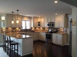 A work triangle, or the space between your stove, refrigerator, and sink. Small Kitchen Layouts U Shaped Novocom Top