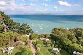 On The Heights Of Cancale Overlooking The Bay Of Mont Saint Michel The Garden Cottage The Rimains By Jane And Olivier R Cancale Paysage France Gite Bretagne