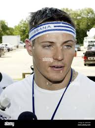 St. Louis Rams' Adam Archuleta speaks to reporters upon his arrival at  training camp, Tuesday, July 27, 2004, in Macomb, Ill. The Rams open  training camp Wednesday. (AP Photo/James A. Finley Stock