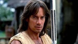 This is a collectible trading card. What The Cast Of Hercules Looks Like Today