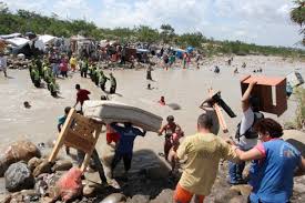 • the colombian foreign minister said 285 people were hurt, with 37 requiring hospitalization, after the venezuelan national guard fired tear gas and rubber bullets at protesters near the colombian border. Chaos On Colombia Venezuela Border