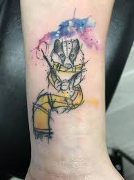 Hufflepuff Badger Done By Brianne Speakman At Stella S Electric Tattoo In Fayetteville Ar Tattoos Geek Tattoo Hufflepuff Tattoo Tattoos