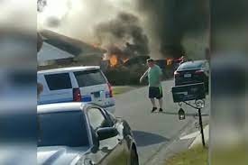 Coast guard ensign morgan garrett, 24, and u.s. Two Dead After Navy Plane Crashes In Alabama Neighborhood